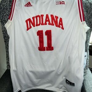 Home and away Indiana jerseys. Isiah Thomas and Victor olidipo